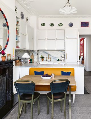 Image may contain Indoors Room Furniture Chair Living Room Interior Design and Kitchen Island