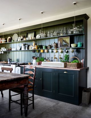 Kitchen Ideas. Image may contain Furniture Kitchen Island Indoors Restaurant Room Wood Shelf Dining Table Table and Cafe