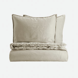 Image may contain Cushion Home Decor Pillow Linen Couch and Furniture