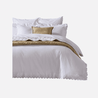 Image may contain Cushion Home Decor Furniture Linen Bed and Pillow
